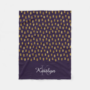 Goldener Glitzer Schlaganfall auf Lila Fleecedecke