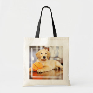 Goldener Retriever mit Basketballspielzeug Tragetasche