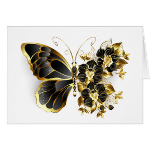 Goldener Schmetterling mit schwarzem Orchid