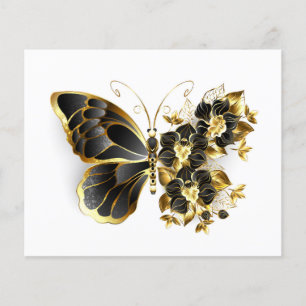 Goldener Schmetterling mit schwarzem Orchid