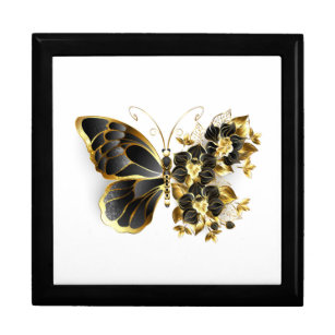 Goldener Schmetterling mit schwarzem Orchid Erinnerungskiste