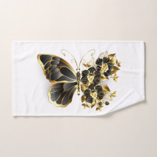 Goldener Schmetterling mit schwarzem Orchid Handtuch