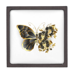 Goldener Schmetterling mit schwarzem Orchid Kiste