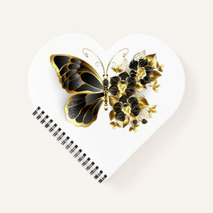 Goldener Schmetterling mit schwarzem Orchid Notizbuch