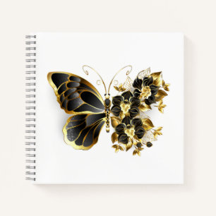Goldener Schmetterling mit schwarzem Orchid Notizbuch