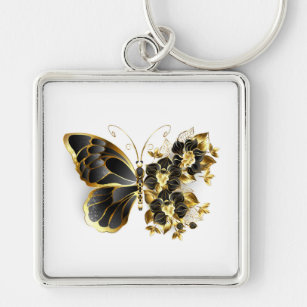 Goldener Schmetterling mit schwarzem Orchid Schlüsselanhänger
