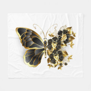 Goldener Schmetterling mit schwarzer Orchidee Fleecedecke