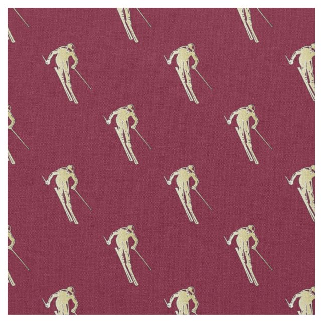 Goldener Skifahrer auf Rot Stoff (Nahaufnahme)