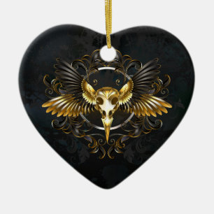 Goldener Vogelschädel auf schwarzem Hintergrund Keramik Ornament