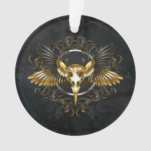 Goldener Vogelschädel auf schwarzem Hintergrund Ornament