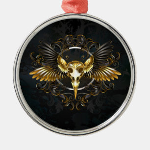 Goldener Vogelschädel auf schwarzem Hintergrund Ornament Aus Metall