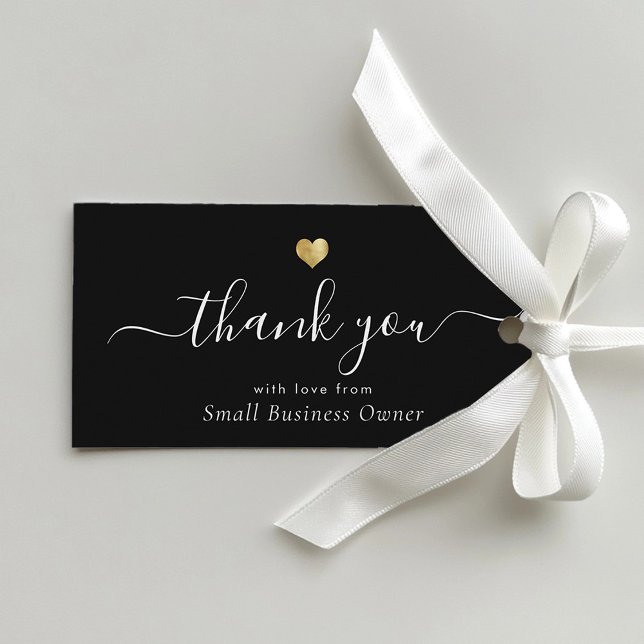 Goldenes Herz Modernes Kalligrafie-Skriptgeschäft Geschenkanhänger (A black thank you card with elegant white script and a small gold heart, tied with a white ribbon.)