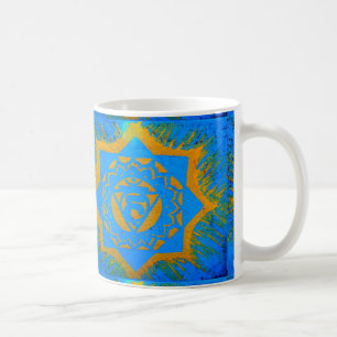 goldenes Tantrylesymbol auf blau Kaffeetasse
