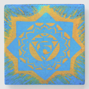 goldenes Tantrylesymbol auf blau Steinuntersetzer