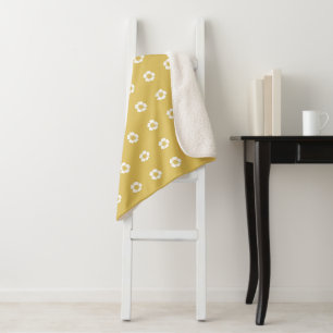 goldgelbe und weiße Buttercup-Blume Sherpadecke