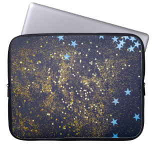 Goldglitter und glitzernde blaue Sterne auf schwar Laptopschutzhülle