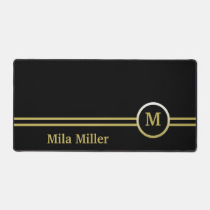 Goldmonogramm auf schwarzem Hintergrund Schreibtischunterlage
