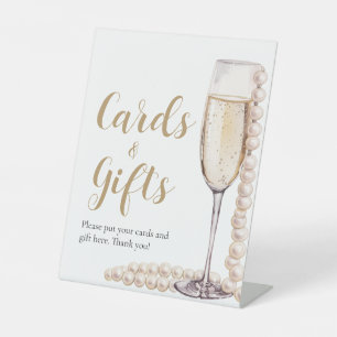 Goldperlen und Prosecco Champagnerkarten und -gesc Sockelschild
