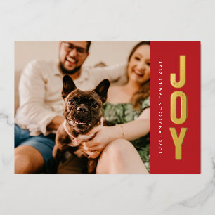 Goldpinsel mit JOY auf Weihnachtsrotem Foto gestem Folien Feiertagskarte