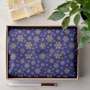 Goldschneeflocken auf blau seidenpapier