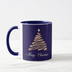 Goldweihnachtsbaum mit frohen Weihnachten Tasse