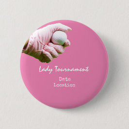 Golf Ball ist in Dame Golfer Hand auf rosa Button