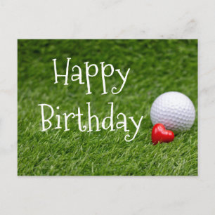 Golf ball with heart are on green grass postkarte