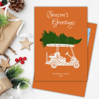 Golf Cart mit Weihnachtsbaum ・ Orangefarbenes Foto