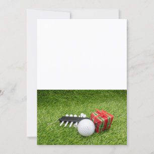 Golf Weihnachten mit Golfball und Geschenk auf Grü Einladung