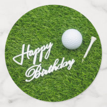 Golf zum Geburtstag mit Ball und Tee auf Grün
