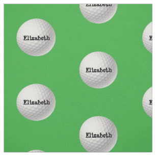 Golfball auf grünem Gewebe Stoff