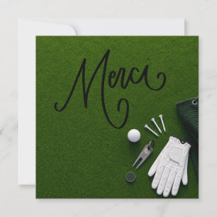 Golfball mit dem Wort Danke auf dem Putting Green