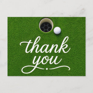 Golfball neben Loch Danke auf grünem Gras Postkarte