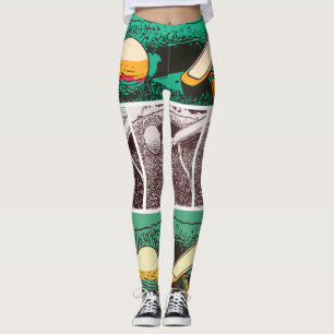 Golfball und Putter auf Grün Leggings