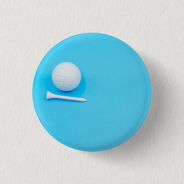Golfball und Tee auf blauem Grund Button (Vorderseite)