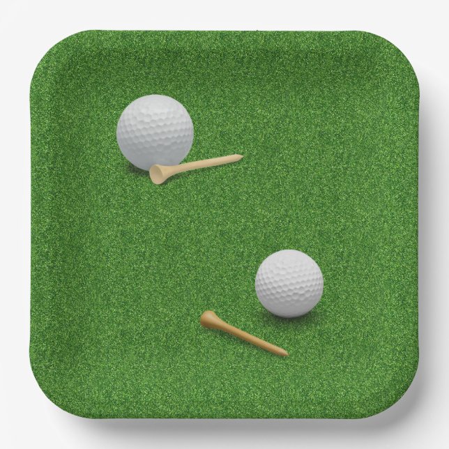 Golfball und Tee auf grünem Gras Hintergrund Pappteller (Vorderseite)