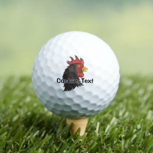 Golfbälle mit schwarzem Hahnkopf