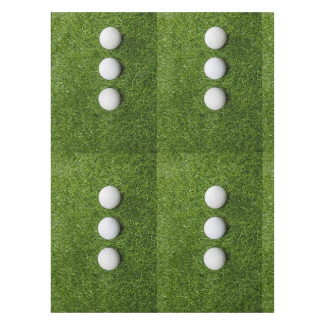Golfbälle sind auf grünem Gras Tischdecke (Vorderseite)