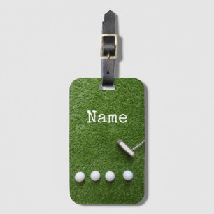 Golfbälle sind auf grünem Gras willkommen beim Gol Gepäckanhänger