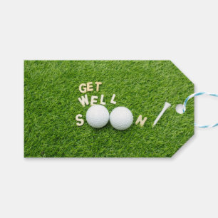 Golfer bald Golf-Bälle und Tee auf grün Geschenkanhänger