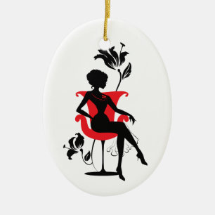 Grafische Silhouette einer Frau, die in einem rote Keramikornament