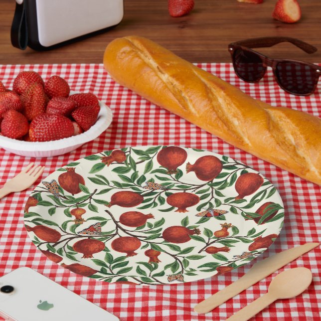 Granatäpfel und Bella Moths auf weißem Boden Pappteller (Picknick)