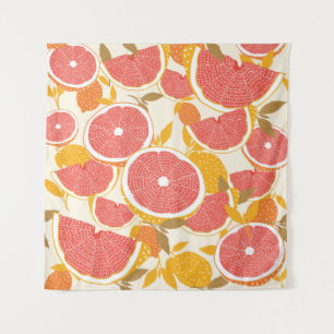 Grapefruit und halbierte Scheiben mit Blätter auf Wandteppich