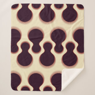 Graue, kugelförmige Formen, braune Farbmuster. Sherpadecke