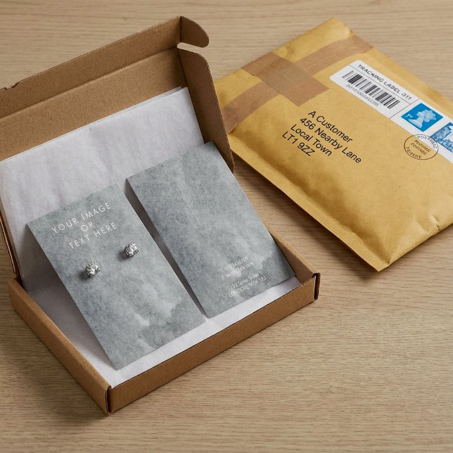 Graue Ohrring-Grafikkarte (Von Creator hochgeladen)