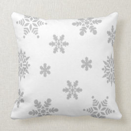 Graue Schneeflocken fallen Kissen