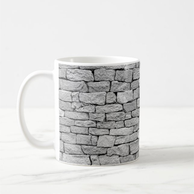 Graue Steinmauer, abstrakter Hintergrund. Kaffeetasse (Links)