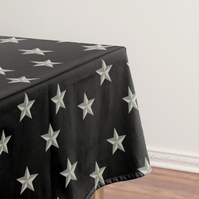 Graue Sternmuster auf schwarz Tischdecke (Beispiel)