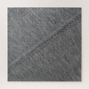 Grauer Stoff: abstrakt geheftete Textur. Puzzle