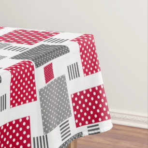 Graues rotes Polka-Dot-Patchwork auf weißem Hinter Tischdecke